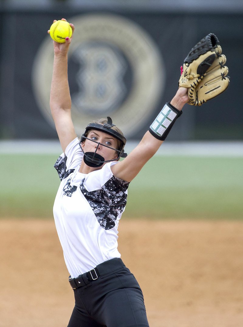 Bentonville High’s Maddy Prough delivers a pitch Thursday against Rogers High at Bentonville. Prough pitched a perfect game with 19 strikeouts.