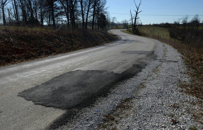 Patches can be seen in the pavement Feb. 24, along Stoney Point Road in eastern Benton County.