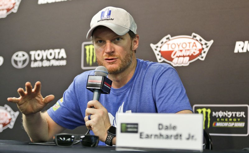 Dale Earnhardt Jr. gestures during a press conference after practice for Sunday's NASCAR Cup Series auto race at Richmond International Raceway in Richmond, Va., Friday, April 28, 2017. NASCAR'S most popular driver for each of the past 14 seasons, returns to the track for the first time since announcing that the 2017 season will be his last. 