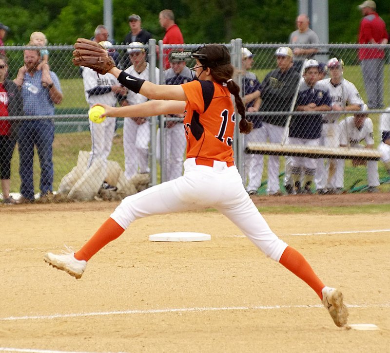 Cally Kildow, Gravette freshman pitcher, gets ready to fire off a pitch during the district championship game against Pea Ridge played in Gravette on Friday, April 28, 2017.