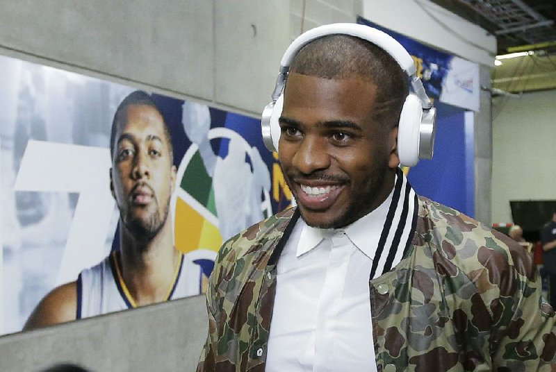 Los Angeles Clippers guard Chris Paul arrives for Game 6 of an NBA basketball first-round playoff series against the Utah Jazz Friday, April 28, 2017, in Salt Lake City. 