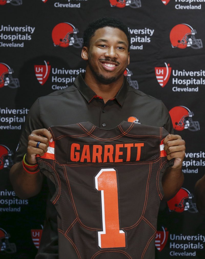 Cleveland Browns' Myles Garrett poses for a photo during a news conference at the NFL team's training facility, Friday, April 28, 2017, in Berea, Ohio. (AP Photo/Ron Schwane)