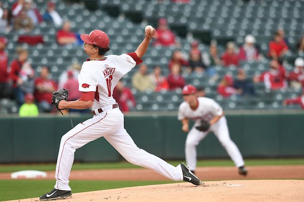 Arkansas' Blaine Knight sends in a pitch against Ole Miss Thursday April 27, 2017 at Baum Stadium in Fayetteville. 