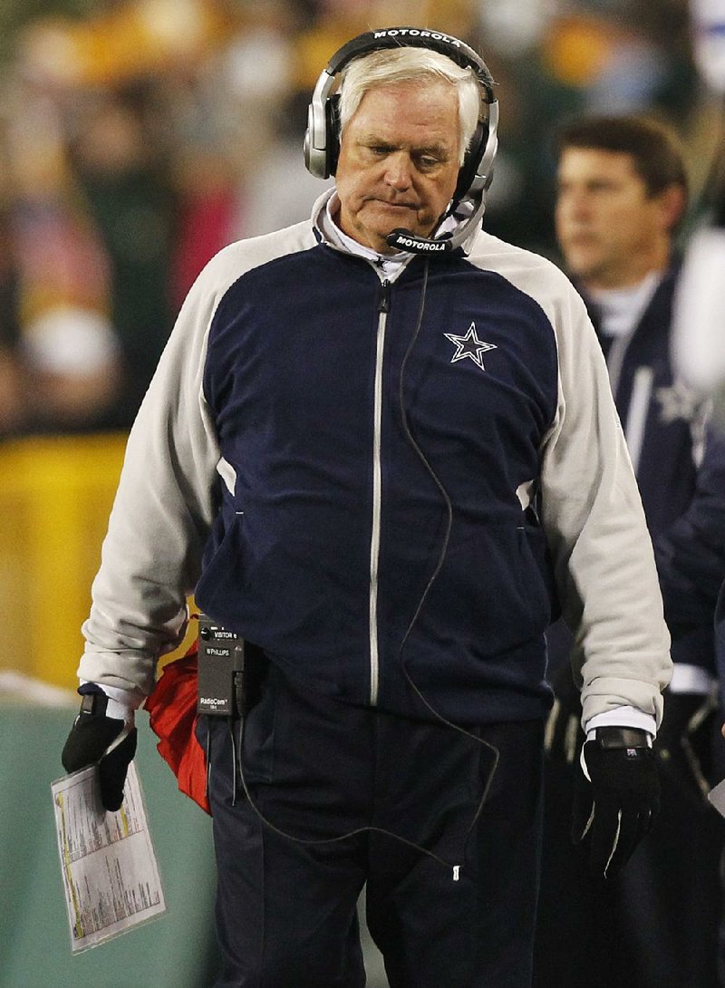 Former Dallas Cowboys head coach Wade Phillips reacts during the first half of an NFL football game against the Green Bay Packers Sunday, Nov. 7, 2010, in Green Bay, Wis. 