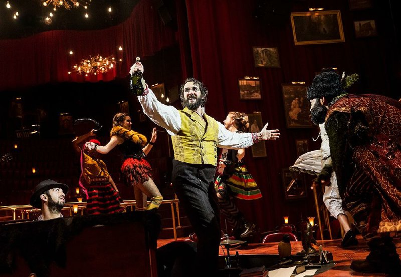 Josh Groban takes center stage during a performance of Natasha, Pierre & the Great Comet of 1812. The musical is inspired by a  melodrama at the center of Leo Tolstoy's War and Peace. 