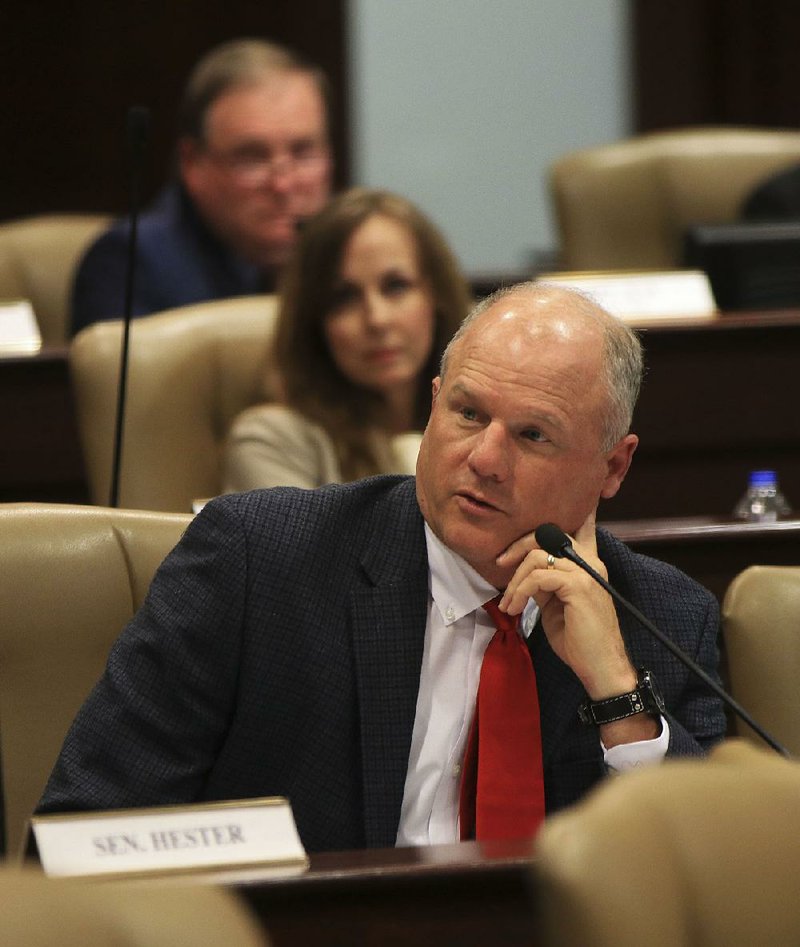  Sen. Jim Hendren, R-Sulphur Springs, answers a question Tuesday morning in Joint Budget Committee about his bill, SB 5, to create a long-term reserve fund. 