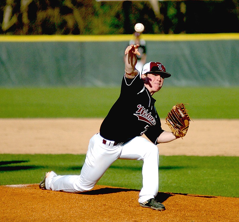 MARK HUMPHREY ENTERPRISE-LEADER Lincoln junior Jacob Anderson delivers a pitch against Farmington. The Cardinals beat Lincoln, 13-3, in a run-rule shortened game April 11.