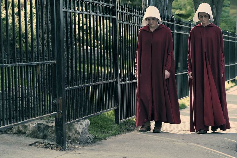 The Handmaid’s Tale is playing on Hulu. Starring Elisabeth Moss (left) and Alexis Bledel, the series is an outstanding alternative for those who have cut the cable.
