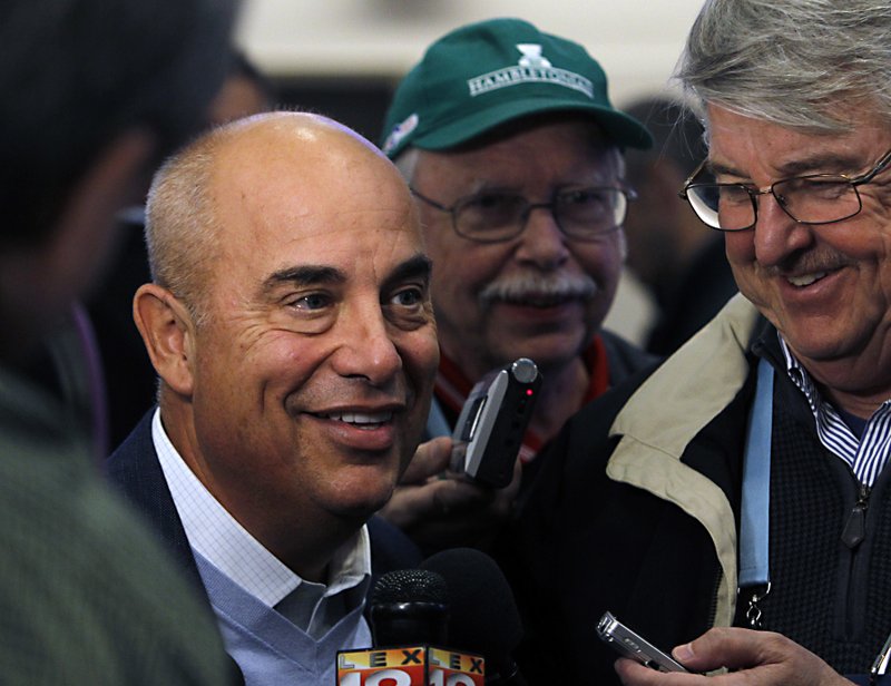 In this file photo Trainer Mark Casse laughs with reporters following the post position draw for the 143rd running of the Kentucky Derby, at Churchill Downs in Louisville, Ky., Wednesday, May 3, 2017. (AP Photo/Garry Jones)