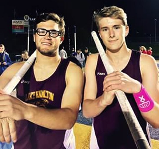 Submitted photo HIGHER GROUND: Lake Hamilton vaulters Michael Harris, left, and Haze Farmer are among the favorites in today's Class 6A track meet at Wolf Stadium.