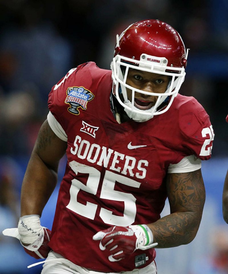 Former Oklahoma running back Joe Mixon was drafted in the second round by the Cincinnati Bengals, but a local TV station is calling for a Bengals boycott. In a 2014 security video, Mixon was shown punching a woman
in the face.