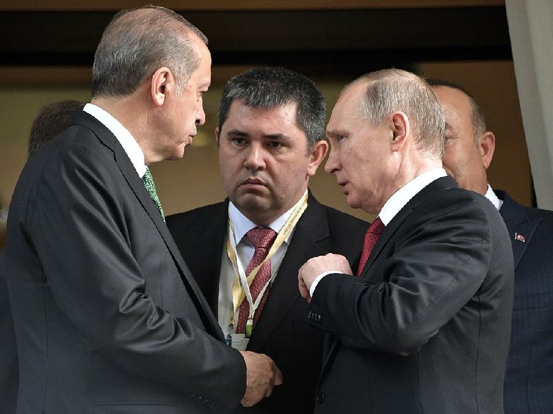 Presidents Recep Tayyip Erdogan (left) of Turkey and Vladimir Putin (right) of Russia meet Wednes- day in Sochi, Russia, where they discussed the quagmire in Syria. 