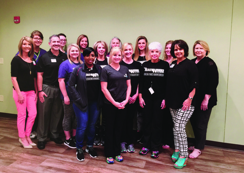 Training: Employees from HealthWorks Fitness Center and Life Touch Hospice, back row, from left, Heather Hutcheson, Michaela Sullivan, Melissa Henley, Linda Stringfellow, Carrie Osbon, Lacey Fincher and Diane Parker; center row, Bethany Cheatham, Clem Saenz, Meagan King, Jan Culp, Terry Clark, Janet Presley and Lori DeWese and front row, Catina Frazier and Rhonda Sayers, recently attended a class to learn about how to interact with people living with dementia. (Not pictured is Jane Victoria).