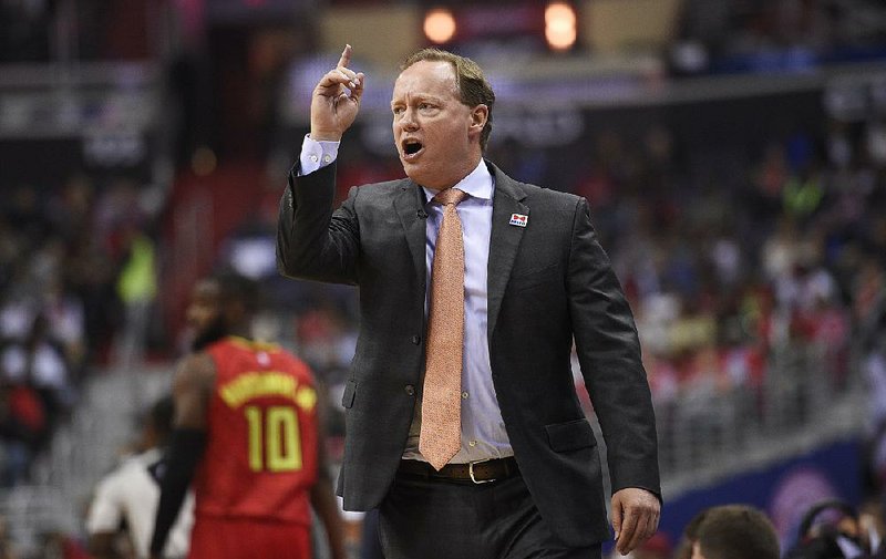 Atlanta Coach Mike Budenholzer, who led the Hawks to a 43-39 record during the regular season before losing to Washington 4-2 in the first round of the NBA playoffs, relinquished his duties as the team’s president of basketball operations Friday.