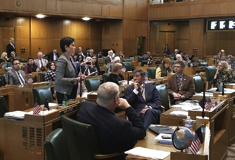 Oregon state Rep. Karin Power, D-Milwaukie, speaks on the House floor in Salem last month in support of her bill that would ban most no-cause evictions, while giving cities in Oregon the freedom to adopt their own rent-control policies.
