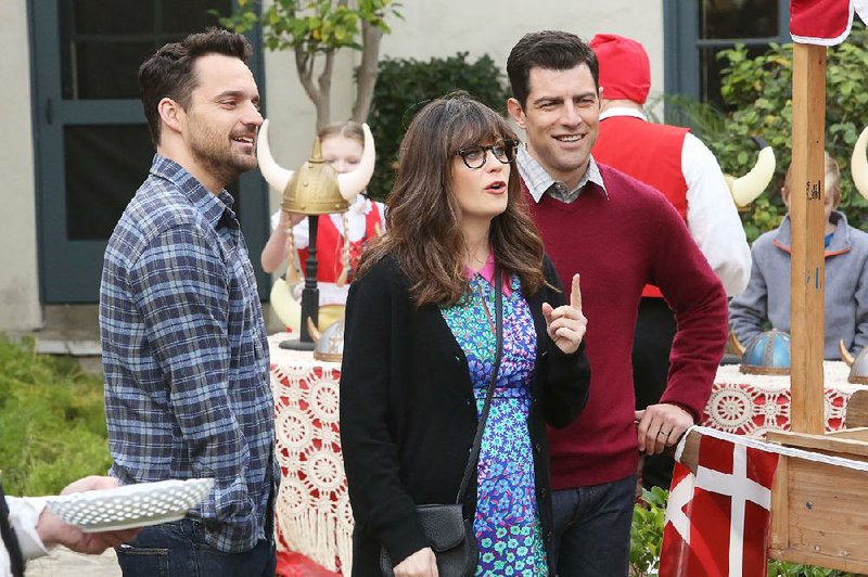 After six seasons on Fox, New Girl is on the bubble and awaits word on whether it will return in the fall. The series stars (from left) Jake Johnson, Zooey Deschanel and Max Greenfield.