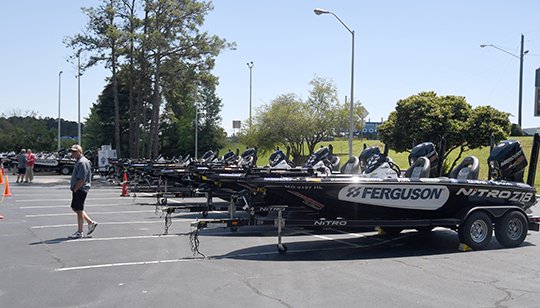 The Sentinel-Record/Mara Kuhn GETTING READY: Anglers arrive for Major League Fishing's Bass Pro Shop Summit Select at The Clarion on Lake Hamilton on Friday. The six-day bass fishing competition will begin on Sunday, and 24 pro fishermen from across the country will compete.