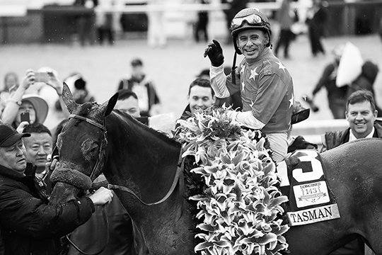 The Associated Press AN "ABEL" FINISH: Mike Smith celebrates after riding Abel Tasman to victory in the 143rd running of the Kentucky Oaks horse race at Churchill Downs Friday in Louisville, Ky.