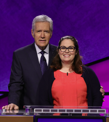 Mary Parker, who teaches at Rogers Heritage High School in Rogers, poses with Jeopardy! host Alex Trebek. Photos courtesy Jeopardy Productions, Inc.