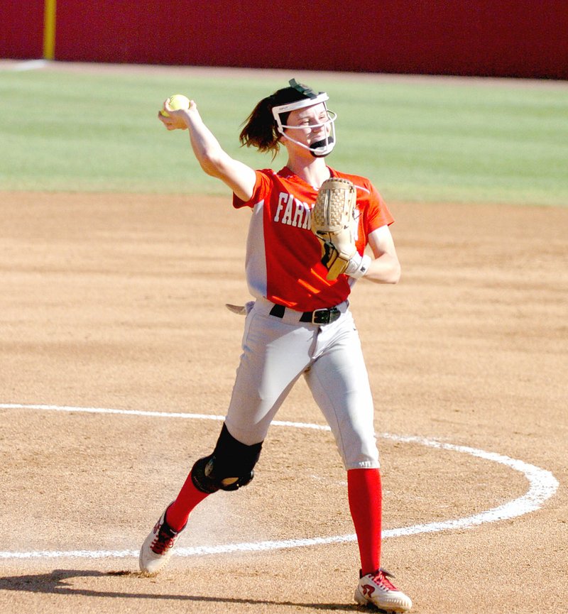 MARK HUMPHREY ENTERPRISE-LEADER Farmington junior Paige Devescery throws out a Vilonia runner at first after fielding a groundball. The Lady Cardinals lost in the 5A West Conference tournament semifinals, 3-1, on Friday.