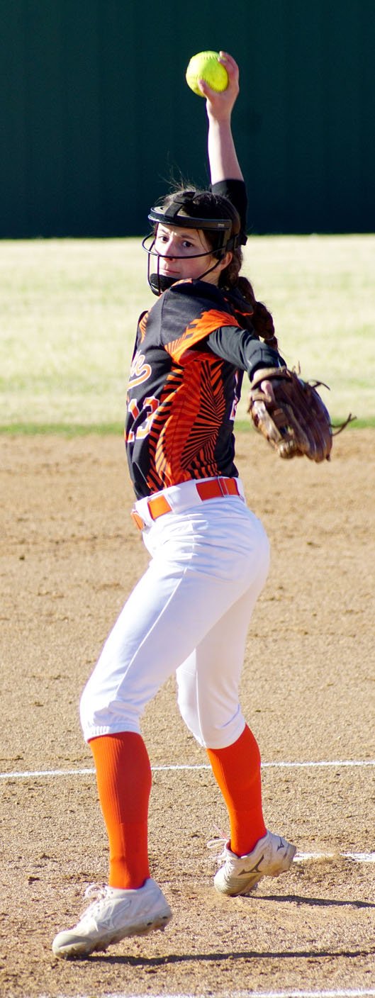 Photo by Randy Moll Cally Kildow, Gravette freshman, gets ready to throw a pitch during a home game on Thursday, April 6, 2017.