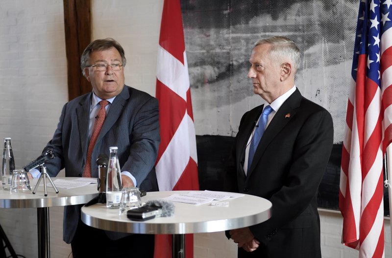 US Secretary of Defense Jim Mattis, right, stands with Danish Defense Minister Claus Hjort Frederiksen, during a press conference, in Copenhagen, Denmark, Tuesday, May 9, 2017. 