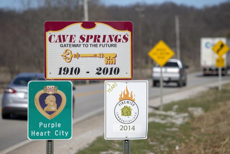 NWA Democrat-Gazette/JASON IVESTER
Traffic travels north along Main Street on Friday, Jan. 28, 2017, into Cave Springs.