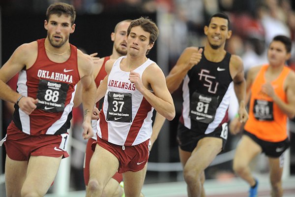 Arkansas' Cale Wallace (37) competes in the mile invitational during the Razorback Invitational Saturday, Feb. 1, 2014, at the Randal Tyson Track Center in Fayetteville.