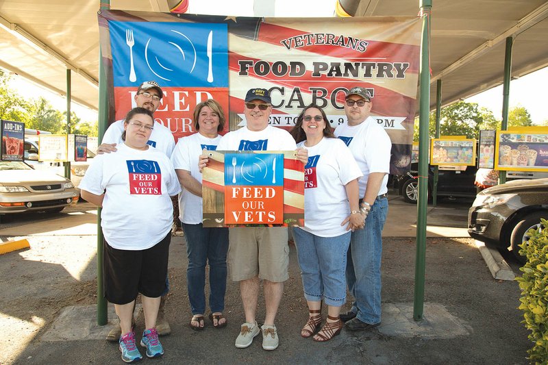 April Banks, from left, Todd Banks, Deyonka Hickey, James Zollicoffer’, Joyce Short and Joe Short represent Feed Our Vets at a fundraiser. Feed Our Vets is a new veterans’ food pantry in Cabot.