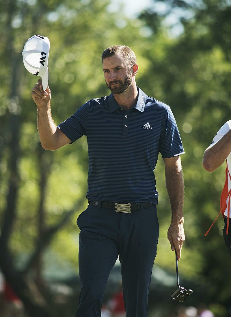 Dustin Johnson said he keeps his emotions in check after winning golf tournaments. 