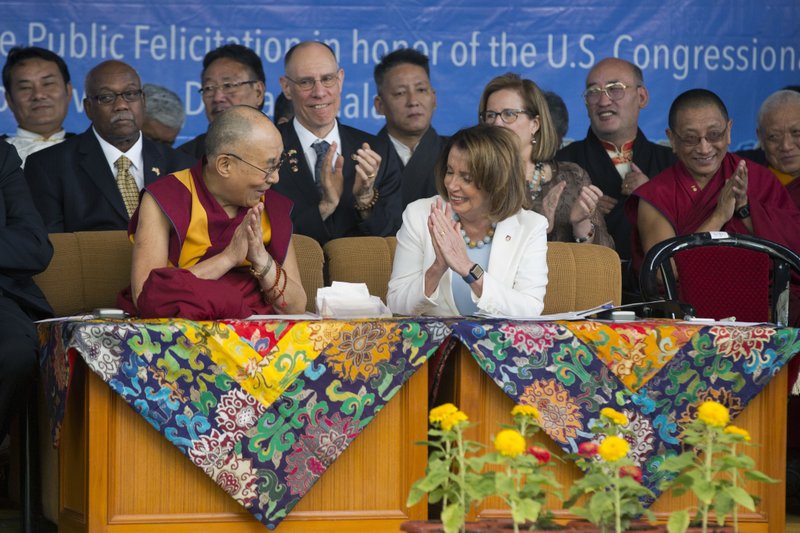 Democratic leader in the U.S. House of Representatives Nancy Pelosi greets Tibetan spiritual leader Dalai Lama at the Tsuglagkhang temple in Dharmsala, India, Wednesday, May 10, 2017. A group from the U.S. House of Representatives has taken aim at one of China's sore spots, Tibet, during a gathering in India with the Dalai Lama. 