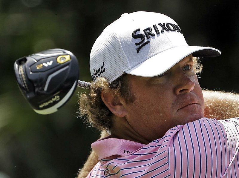 William McGirt watches his tee shot at No. 15 in Thursday’s first round of the Players Championship at TPC Sawgrass in Ponte Vedra Beach, Fla. McGirt is tied at 5 under with Mackenzie Hughes.