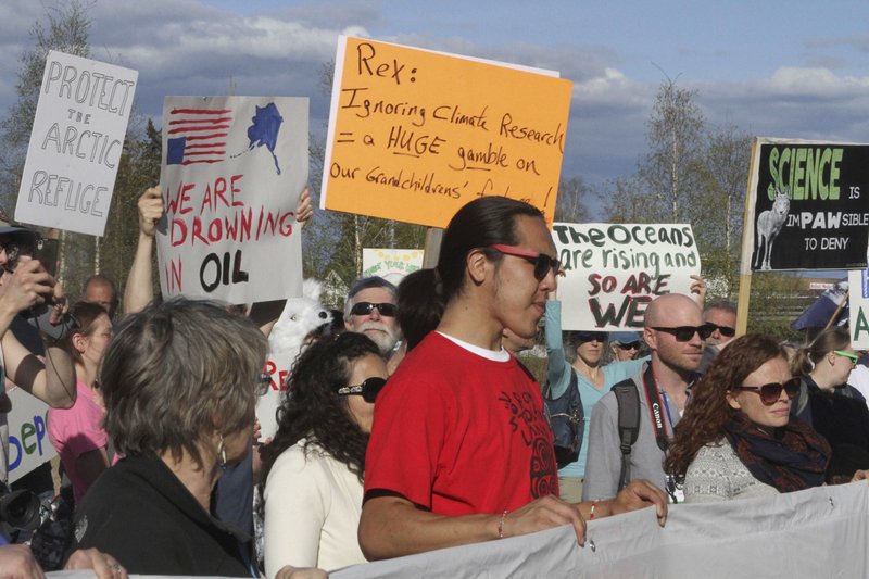 A few hundred people chanted slogans and made speeches to protest the presence of U.S. Secretary of State Rex Tillerson in Fairbanks, Alaska, on Wednesday, May 10, 2017. High-level officials from the world's eight Arctic nations, including Tillerson, will meet in Alaska amid concerns about the future of the sensitive region after President Trump called for more oil drilling and development. 