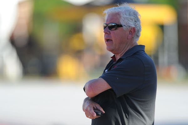 Arkansas women's track and field coach Lance Harter watches Saturday, April 23, 2016, during the John McDonnell Invitational at John McDonnell Field in Fayetteville.