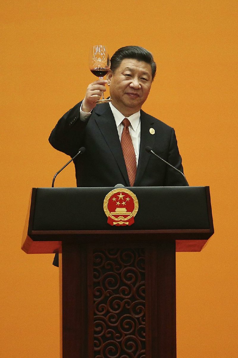 Chinese President Xi Jinping toasts participants in the Belt and Road Forum during a banquet at the Great Hall of the People in Beijing on Sunday.