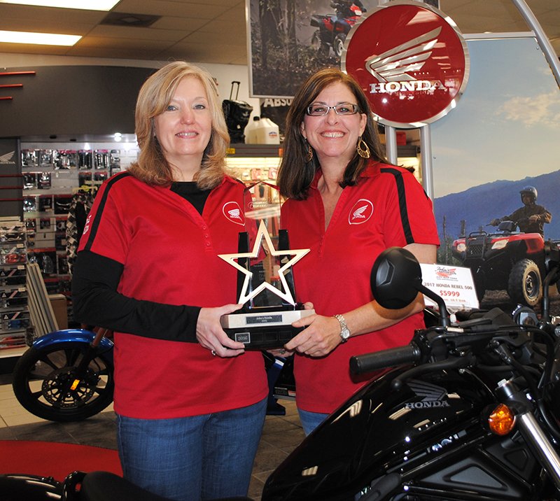 Submitted photo John's Honda won the COE Award for the second year in a row. In 2016, there were approximately 1,000 Powersports dealers. Of these, 138 dealers won the COE award and John's Honda was one of the winners. Of John's Honda's specific volume classification of 23 dealers, the top six dealers within the group wins the COE award. Holding the award are Vickie Willingham, left, owner and sales manager, and Deborah Duggan, sales associate. Located at 111 Carl Drive, John's Honda may be called at 501-623-1495. Hours of operation are 9 a.m. to 5:30 p.m. Tuesday-Saturday.