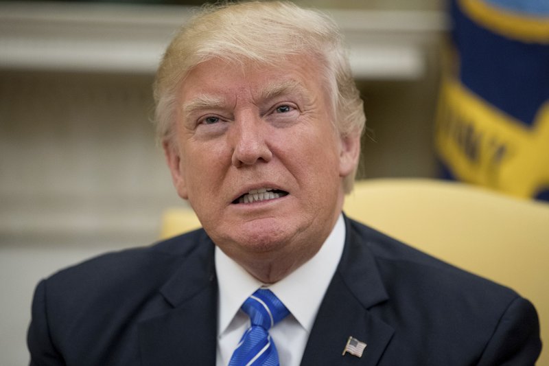 President Donald Trump pauses while meeting with Abu Dhabi's Crown Prince Sheikh Mohammed bin Zayed Al Nahyan, Monday, May 15, 2017, in the Oval Office of the White House in Washington.