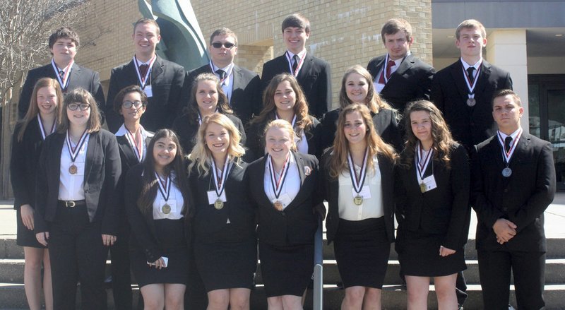 Photo by Debi Graham Members of the Gravette HOSA Club traveled to Hot Springs in March for HOSA state competition, at which 64 Gravette students competed in 20 events. Eighteen Gravette High School students brought home medals. Pictured with their medals are Virdiana Martinez (front, left), gold; Robin Davis, gold; Lacey Robinson, bronze; Abi Krewson, gold; Stephany Todd, gold; Dylan Gruver, silver; Hailee Gerner (middle, left), silver; Amy Whiteside, bronze; Zayan Rodarte, bronze; Danica Tate; bronze; Alex Krewson, bronze; Casey Ogle, gold; Hunter Graham (back, left), gold; Dane Hilger, silver; Nick Dawson, gold; Nick Newbill, gold; Billy Allen, silver; Drew Hendren, bronze.