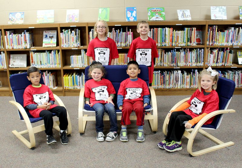 Submitted Photo &#8220;Pawsitive&#8221; and Wise Students for the month of May at Glenn Duffy Elementary School were honored at the school&#8217;s monthly Rise and Shine assembly May 1. Pictured wearing the T-shirts they were given are PAWS award winners Avery Hannah of Bella Vista (seated, left), Elizabeth Nichols of Gravette, Abisai Lopez of Gravette, Palmer Pittman of Gravette, Payton Henry (standing, left) of Gravette and Payton Burnett of Gravette.