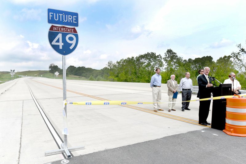 Flip Putthoff/NWA Democrat-Gazette U.S. Rep. Steve Womack (R-Rogers) speaks May 10 during the dedication of a section of the Bella Vista bypass.