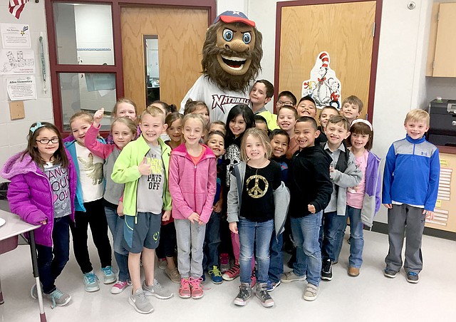 Photo submitted Ms. George&#8217;s first-grade class collected the most food of any first-grade classroom at Allen Elementary School for Arvest Bank Siloam Springs&#8217; recent &#8220;Strike Out Hunger&#8221; food drive. They were rewarded with a pizza party and a visit from the Northwest Arkansas Natural&#8217;s mascot Strike.