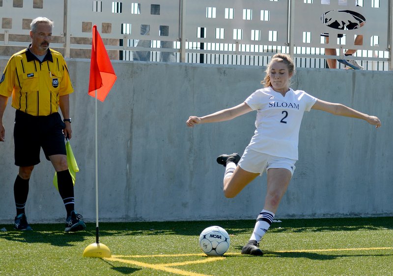 Bud Sullins/Special to the Herald-Leader Siloam Springs junior Sydney Bomstad takes a corner kick Saturday against Benton in the Class 6A state semifinals.