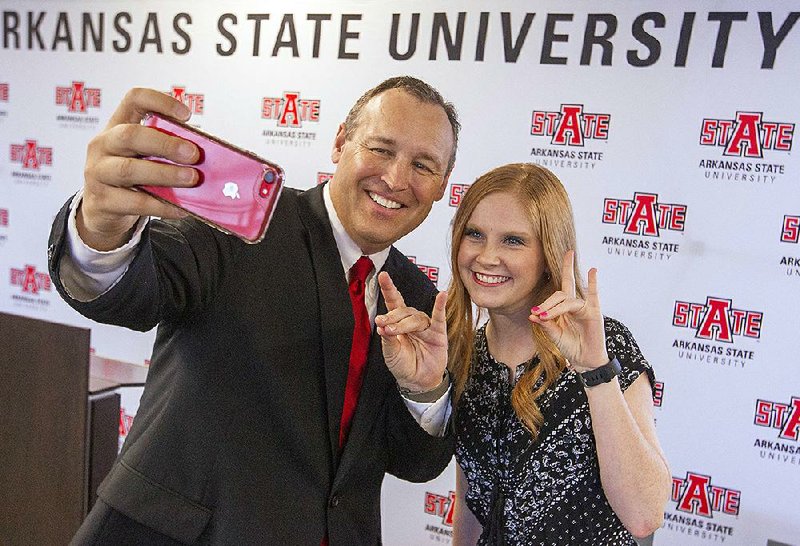 Kelly Damphousse poses with then-ASU student body President Haley Stotts in Little Rock in 2017.