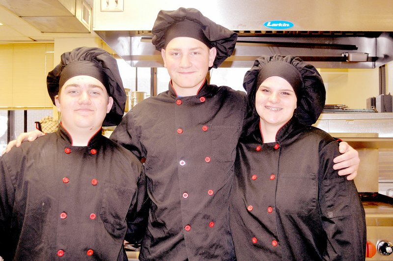 RACHEL DICKERSON/MCDONALD COUNTY PRESS McDonald County High School students John Gordon, left, Brier Phillips and Laynee Tinsley have qualified to go to a national culinary competition.