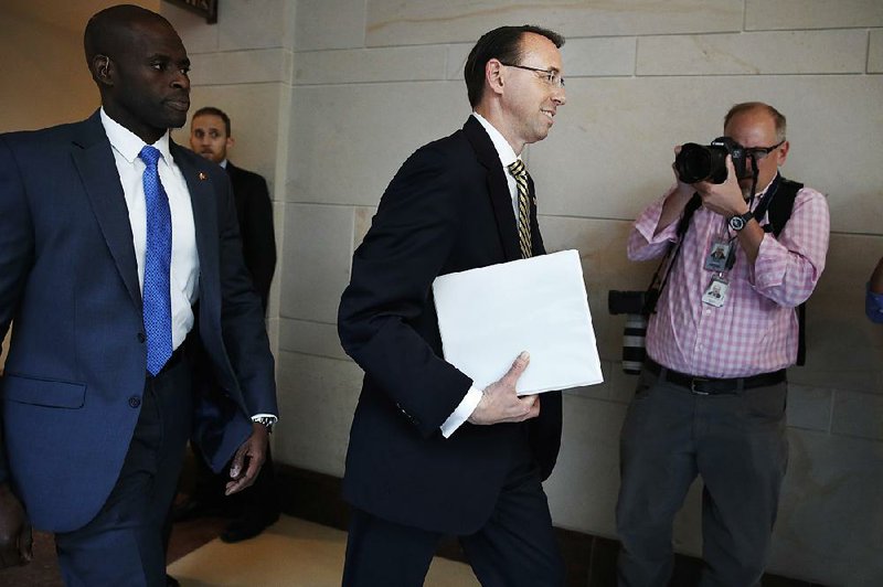 Deputy Attorney General Rod Rosenstein arrives Thursday on Capitol Hill in Washington for a closed meeting with senators a day after appointing former FBI Director Robert Mueller to oversee the investigation into possible ties between Russia and President Donald Trump’s campaign. 