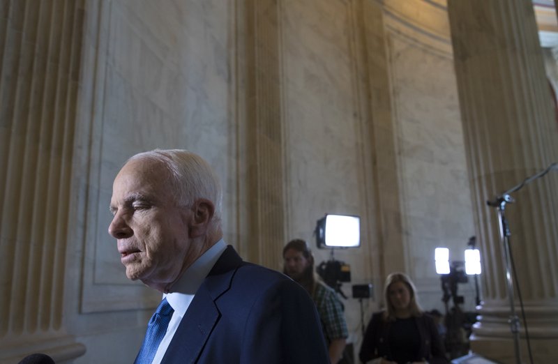 Senate Armed Services Committee Chairman Sen. John McCain, R-Ariz., responds to questions on Capitol Hill in Washington, Thursday, May 18, 2017, the morning after the Justice Department appointed former FBI Director Robert Mueller to lead an investigation into President Donald Trump's firing of FBI Director James Comey.