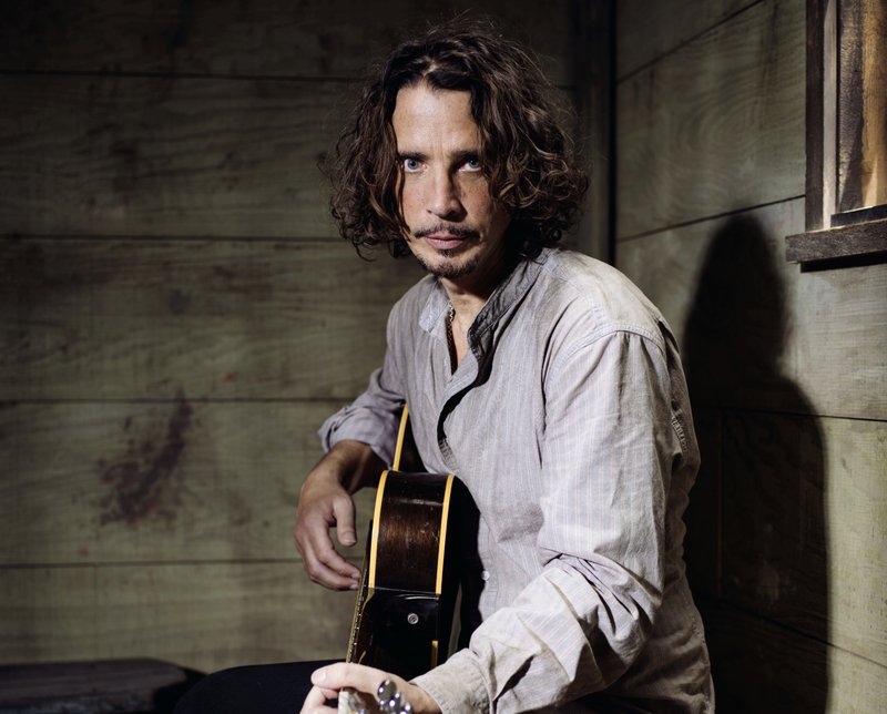 The Associated Press ROCK LEGEND: Chris Cornell plays guitar during a portrait session at The Paramount Ranch on July 29, 2015, in Agoura Hills, Calif. Cornell, 52, who gained fame as the lead singer of the bands Soundgarden and Audioslave, died at a hotel in Detroit and police said Thursday that his death is being investigated as a possible suicide.