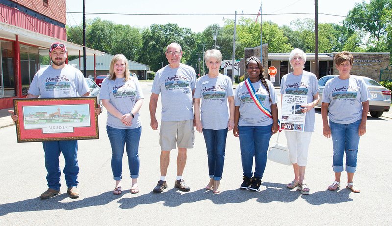 The 20th annual Augusta Days will be Wednesday through May 28 in downtown Augusta. Pictured are members of the Augusta Days committee, from left, Trey Taylor, Toni Hannah, Morgan Berry, Janice Beard, 2016 Miss Augusta Talia Clark, Billie King and Charlotte Hitt. They are standing in the middle of Second Street, where vendors will be set up during the festival.