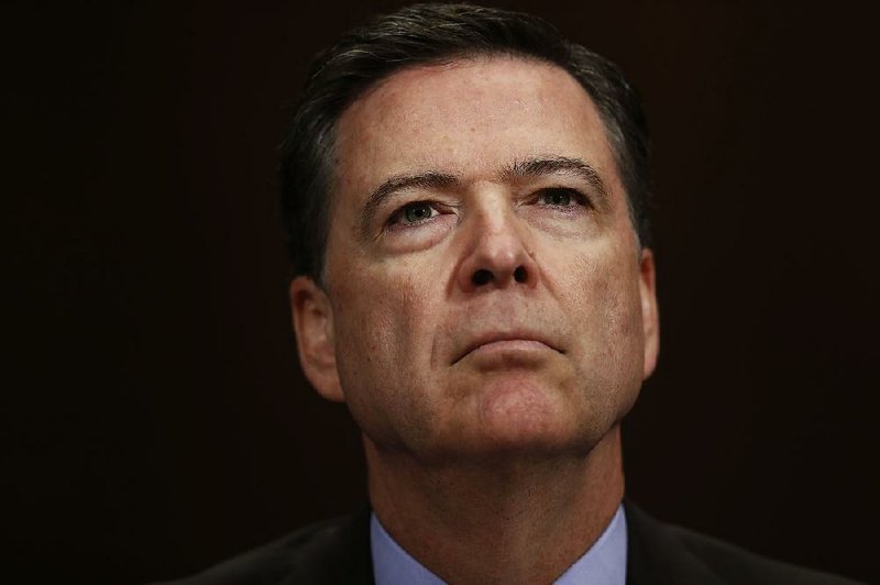 In this May 3, 2017, file photo, FBI Director James Comey listens on Capitol Hill in Washington. Comey's memo relating President Donald Trump’s request to shut down an investigation of his ousted national security adviser is a powerful piece of evidence that could be used to build an obstruction of justice case against the president. 