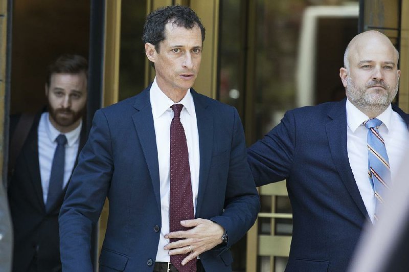 Former U.S. Rep. Anthony Weiner leaves federal court Friday in New York, where he pleaded guilty to transmitting sexual material to a minor. 
